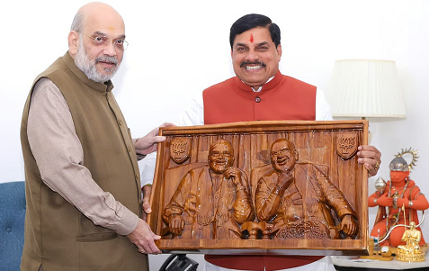 cm mohan meet moh amit shah